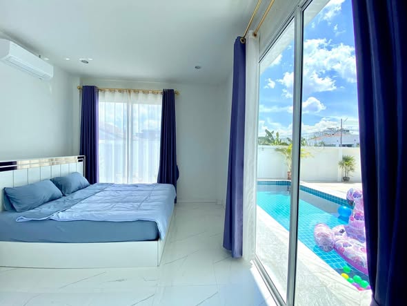 pool and bedroom of I-NINE Pool Villa