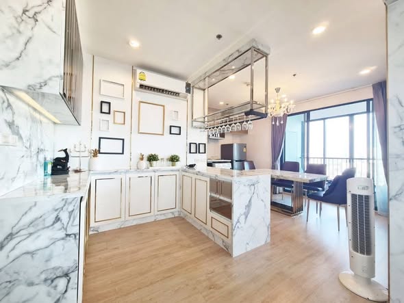 living room and kitchen of Ideo Sathon-Tha Phra