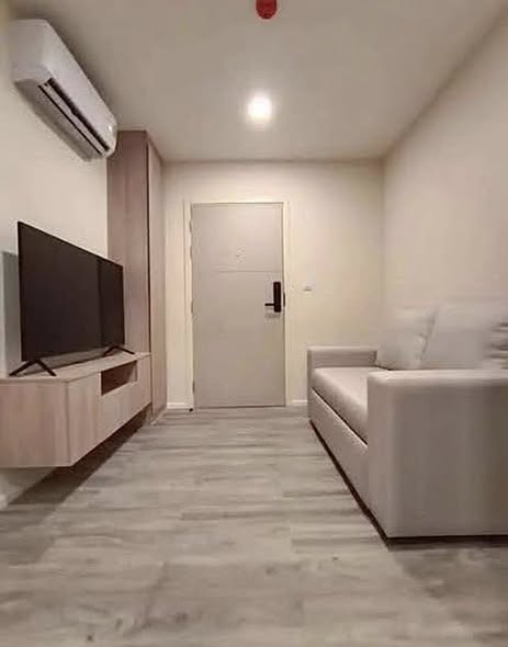 living room and bedroom of IKON SUKHUMVIT 77 CONDOMINIUM