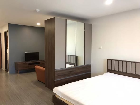 bedroom and room interior of ITF-Silom Palace