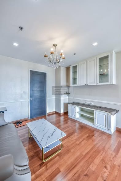 living room and kitchen of Ivy Sathon 10