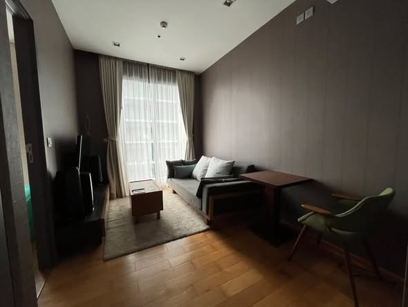 bedroom and living room of Keyne by Sansiri