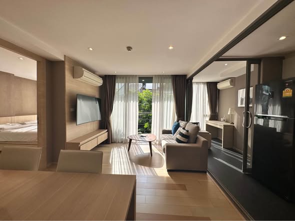 bedroom and living room of Klass Silom Condo