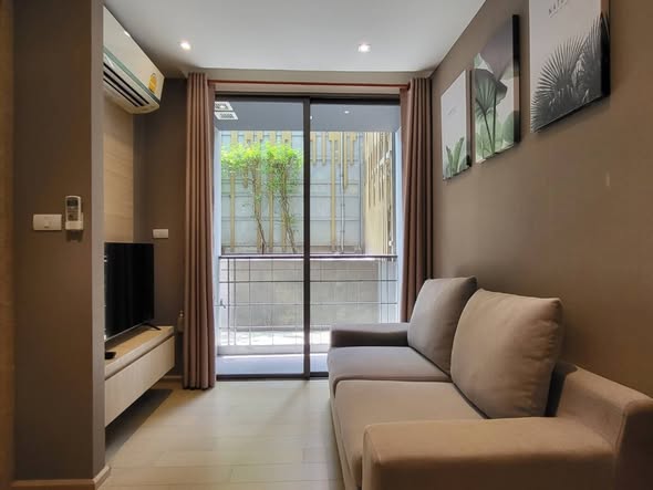 bedroom and living room of Klass Silom Condo