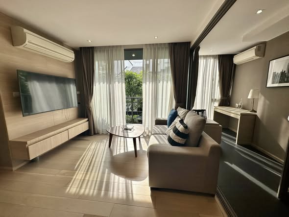 living room and bedroom of Klass Silom Condo