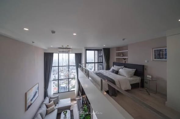 living room and bedroom of KnightsBridge Prime Sathon