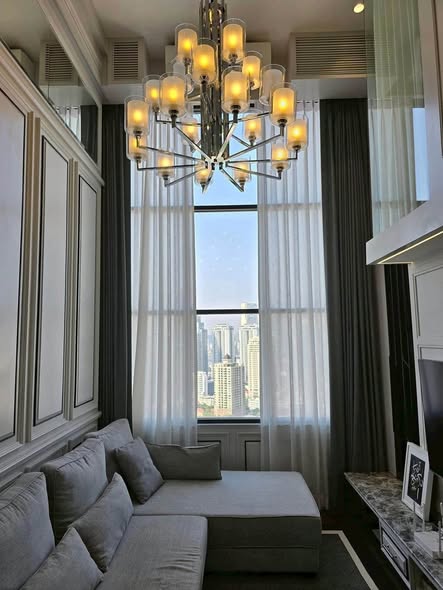 living room and bedroom of KnightsBridge Prime Sathon