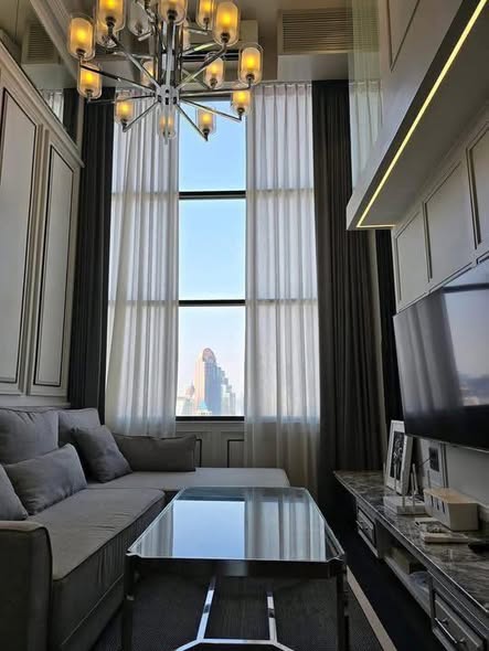 living room and bedroom of KnightsBridge Prime Sathon