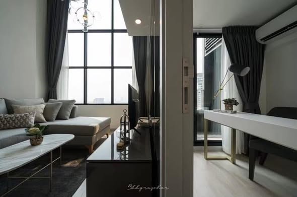 living room and bedroom of KnightsBridge Prime Sathon