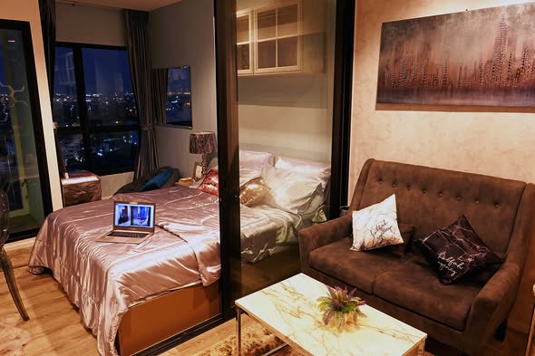 living room and bedroom of Knightsbridge Sky River Ocean Condominium