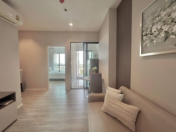 living room and bedroom of Knightsbridge Sky River Ocean Condominium
