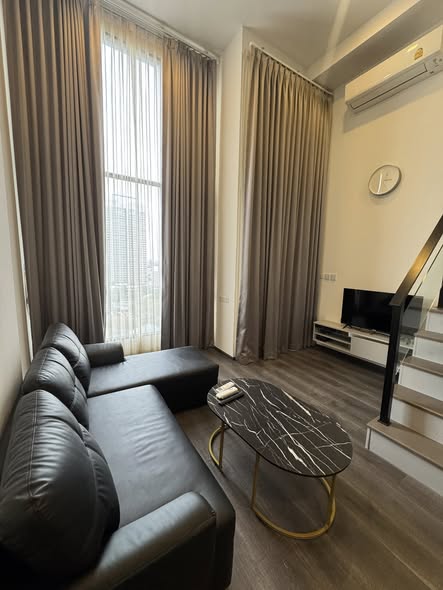 living room and bedroom of KnightsBridge Space Ratchayothin