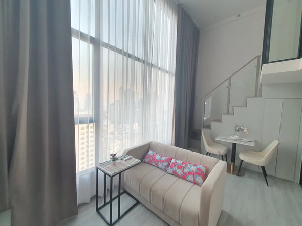 living room and bedroom of KnightsBridge Space Sukhumvit-Rama 4