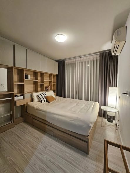 bedroom of L Style Condo
