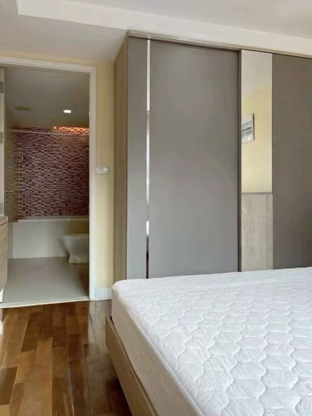 bedroom and room interior of LE NICE CONDO