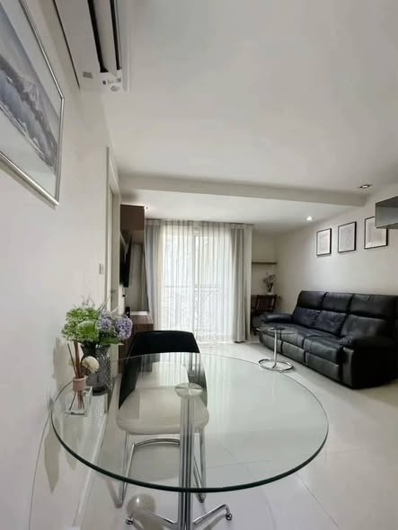living room and bedroom of LE NICE CONDO