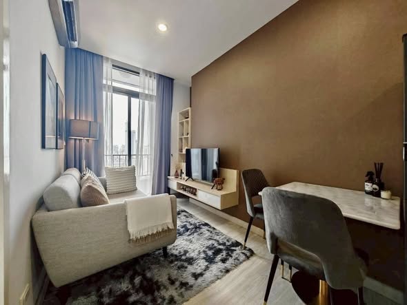 living room and bedroom of อัพเอกมัยคอนโดมิเนียม