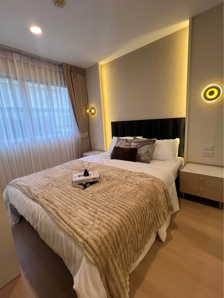 bedroom of Lumpini Condo Town Bodindecha-Ramkhamhaeng
