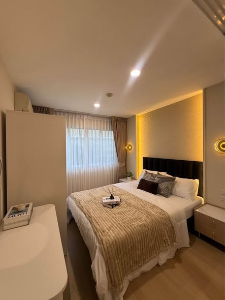 bedroom of Lumpini Condo Town Bodindecha-Ramkhamhaeng