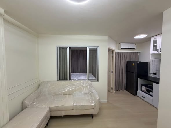 bedroom of Lumpini Condo Town Bodindecha-Ramkhamhaeng