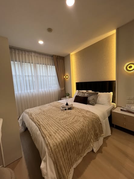 bedroom of Lumpini Condo Town Bodindecha-Ramkhamhaeng