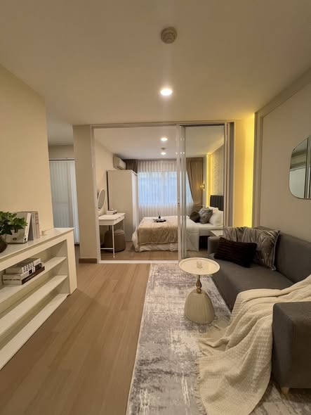 bedroom and living room of Lumpini Condo Town Bodindecha-Ramkhamhaeng
