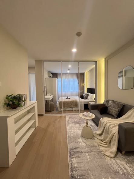 bedroom and living room of Lumpini Condo Town Bodindecha-Ramkhamhaeng