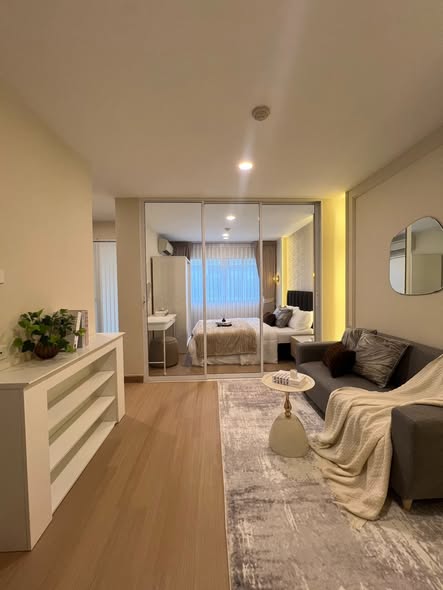bedroom and living room of Lumpini Condo Town Bodindecha-Ramkhamhaeng