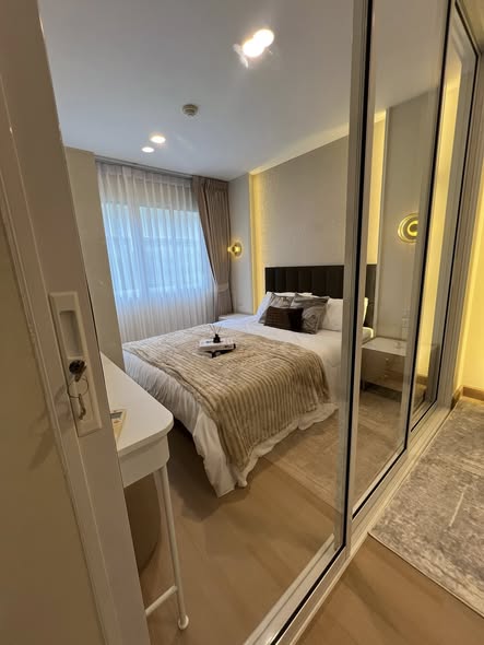 bedroom and room interior of Lumpini Condo Town Bodindecha-Ramkhamhaeng