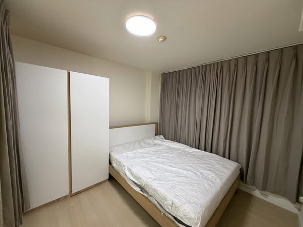 bedroom and room interior of Lumpini Condo Town Bodindecha-Ramkhamhaeng