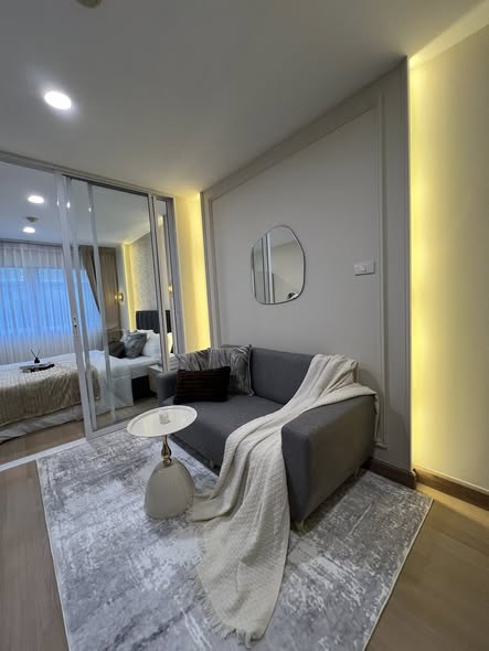 living room and bedroom of Lumpini Condo Town Bodindecha-Ramkhamhaeng