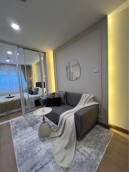 living room and bedroom of Lumpini Condo Town Bodindecha-Ramkhamhaeng
