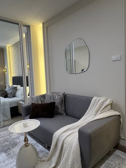 living room and bedroom of Lumpini Condo Town Bodindecha-Ramkhamhaeng