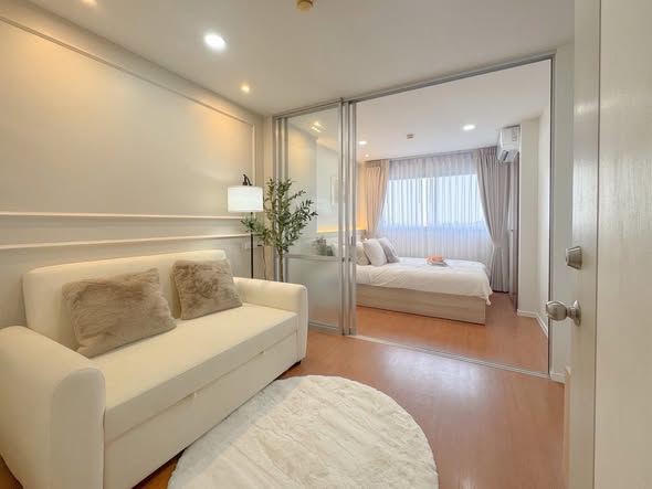 living room and bedroom of Lumpini Condo Town Ram Inthra-Lat Pla Khao 2