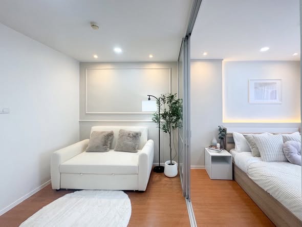 living room and bedroom of Lumpini Condo Town Ram Inthra-Lat Pla Khao 2