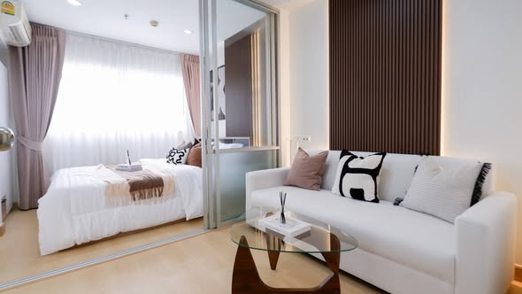 bedroom and living room of Lumpini Mega City Bang Na