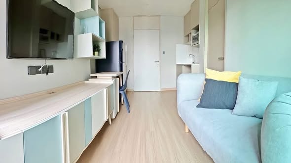 living room and bedroom of Lumpini Suite Phetchaburi – Makkasan