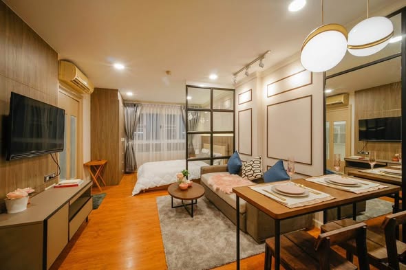 living room and bedroom of Lumpini Suite Sukhumvit 41