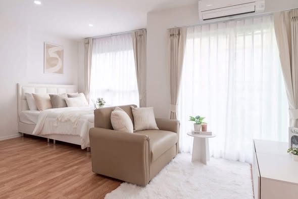 bedroom and living room of Lumpini Ville Pranangklao – Riverview.