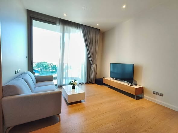 bedroom and living room of Magnolias Waterfront Residences