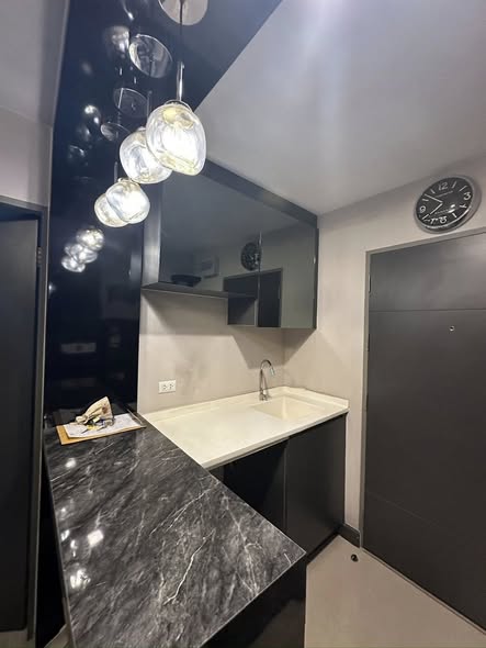 bathroom and kitchen of Metro Luxe Ratchada
