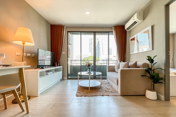 bedroom and living room of Metro Luxe Ratchada
