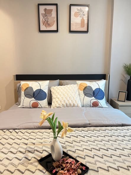 bedroom of Metro Luxe Riverfront Rattanathibet