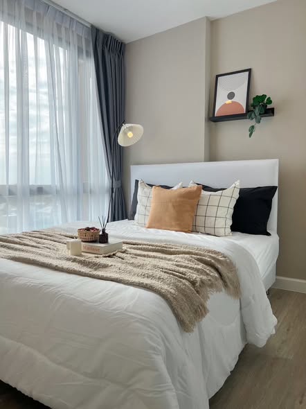 bedroom of Metro Luxe Riverfront Rattanathibet