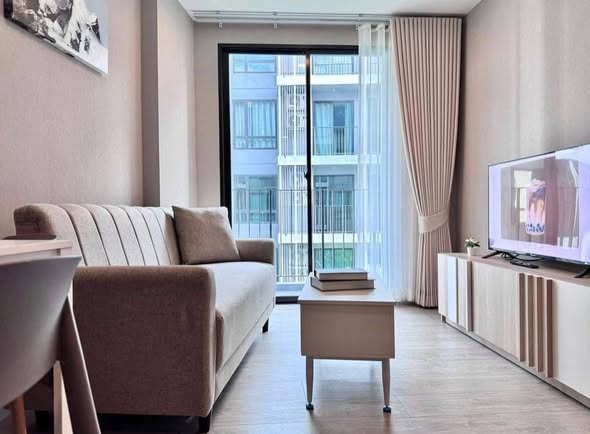 bedroom and living room of Metro Luxe Riverfront Rattanathibet