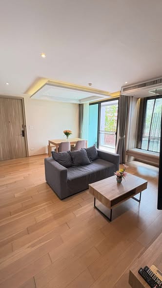 living room and bedroom of Mona Suite Service Apartment – Sukhumvit31