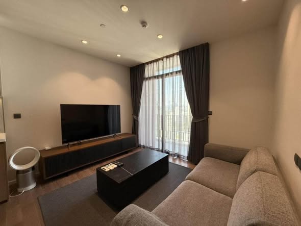living room and bedroom of MUNIQ Sukhumvit 23