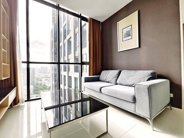 bedroom and living room of Mövenpick Ekkamai Bangkok