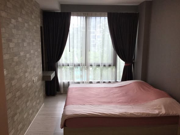 bedroom of My Story Condo