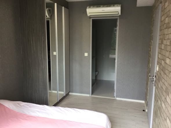 bedroom of My Story Condo